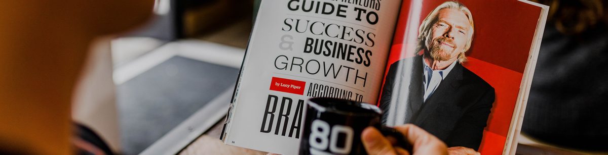 reading a book a bout richard branson and business success