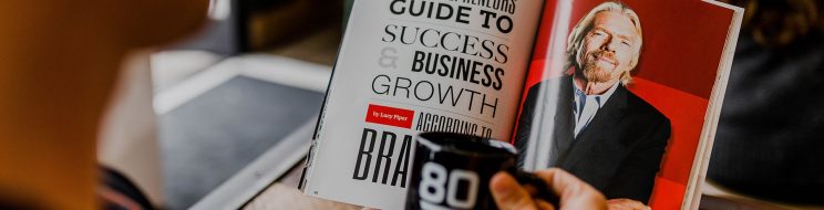 reading a book a bout richard branson and business success