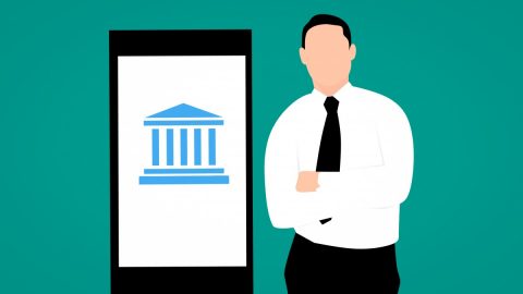 Illustrated image of a bank employee standing next to a digital device