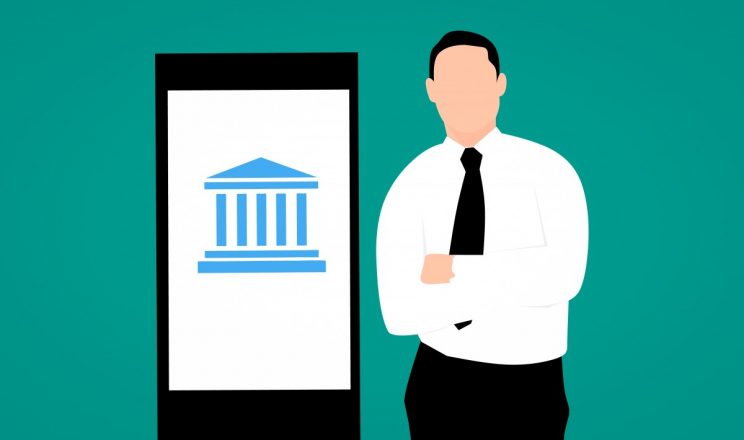 Illustrated image of a bank employee standing next to a digital device